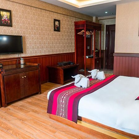 @Siam Hotel Цзинхун Экстерьер фото