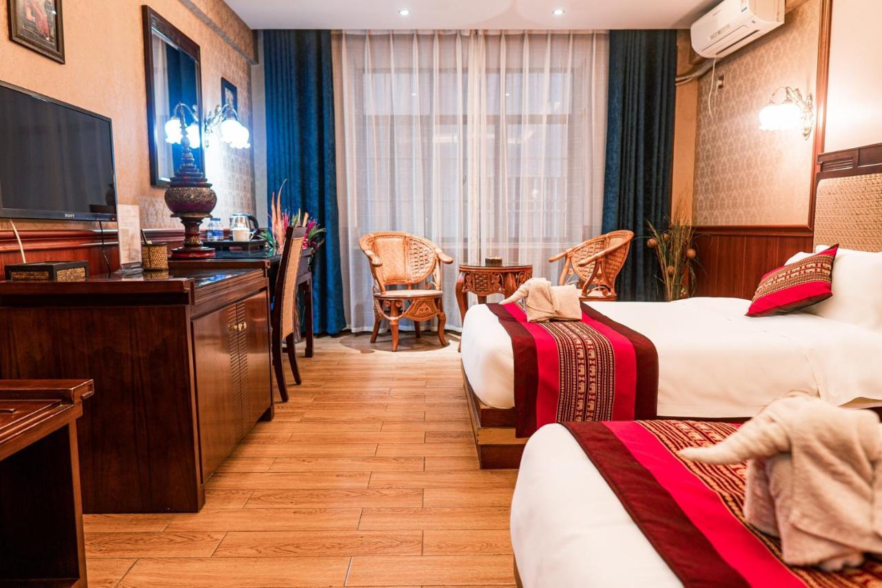 @Siam Hotel Цзинхун Экстерьер фото