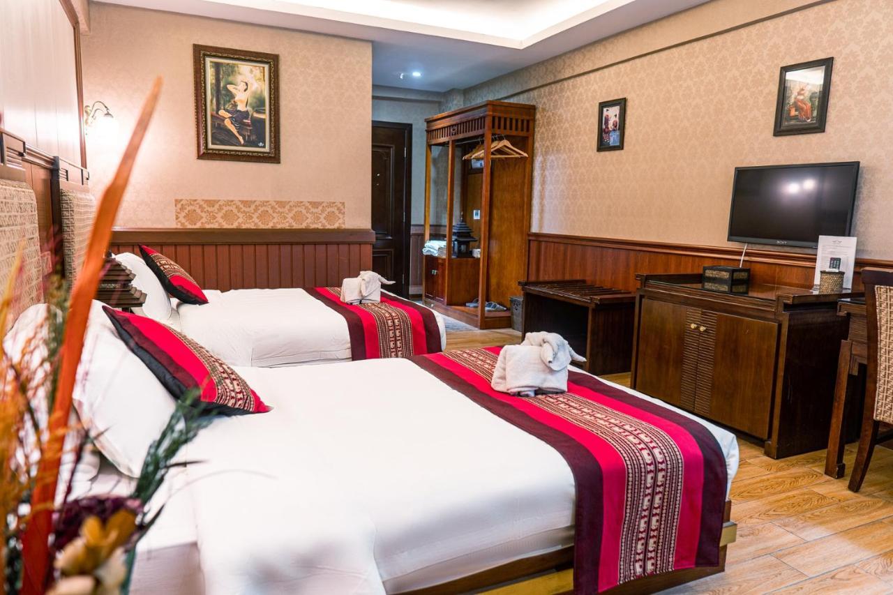 @Siam Hotel Цзинхун Экстерьер фото
